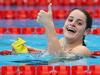 TOKYO, JAPAN - JULY 27:  Kaylee McKeown of Team Australia celebrates after winning the gold medal in the Women's 100m Backstroke Final on day four of the Tokyo 2020 Olympic Games at Tokyo Aquatics Centre on July 27, 2021 in Tokyo, Japan. (Photo by Al Bello/Getty Images)