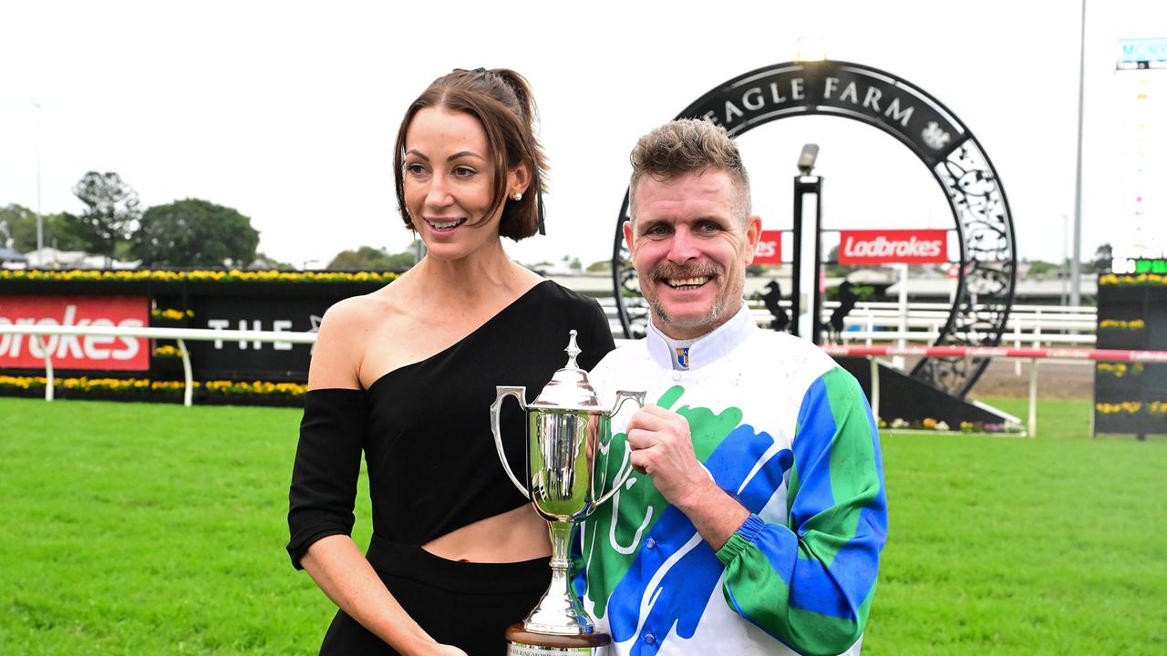 Trainer Katherine Coleman and Luke Nolen celebrate the win of I Wish I Win in the Kingsford Smith Cup. Picture: Grant Peters - Trackside Photography.