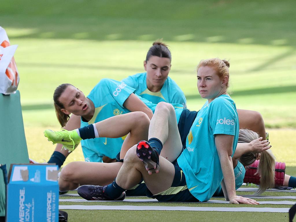 Matildas trio Clare Polkinghorne (front), Emily van Egmond (centre) and Steph Catley prepare themselves for Thursday’s match against Brazil. Picture: Nigel Hallett