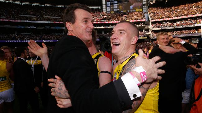 Richmond CEO Brendon Gale and Dustin Martin embrace after the 2017 AFL Grand Final. Picture: Darrian Traynor, Getty Images