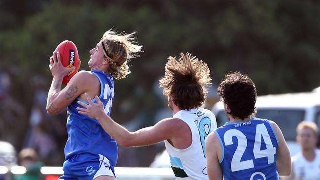 Barwon Heads’ Jye Bartley marks against Geelong Amateur.