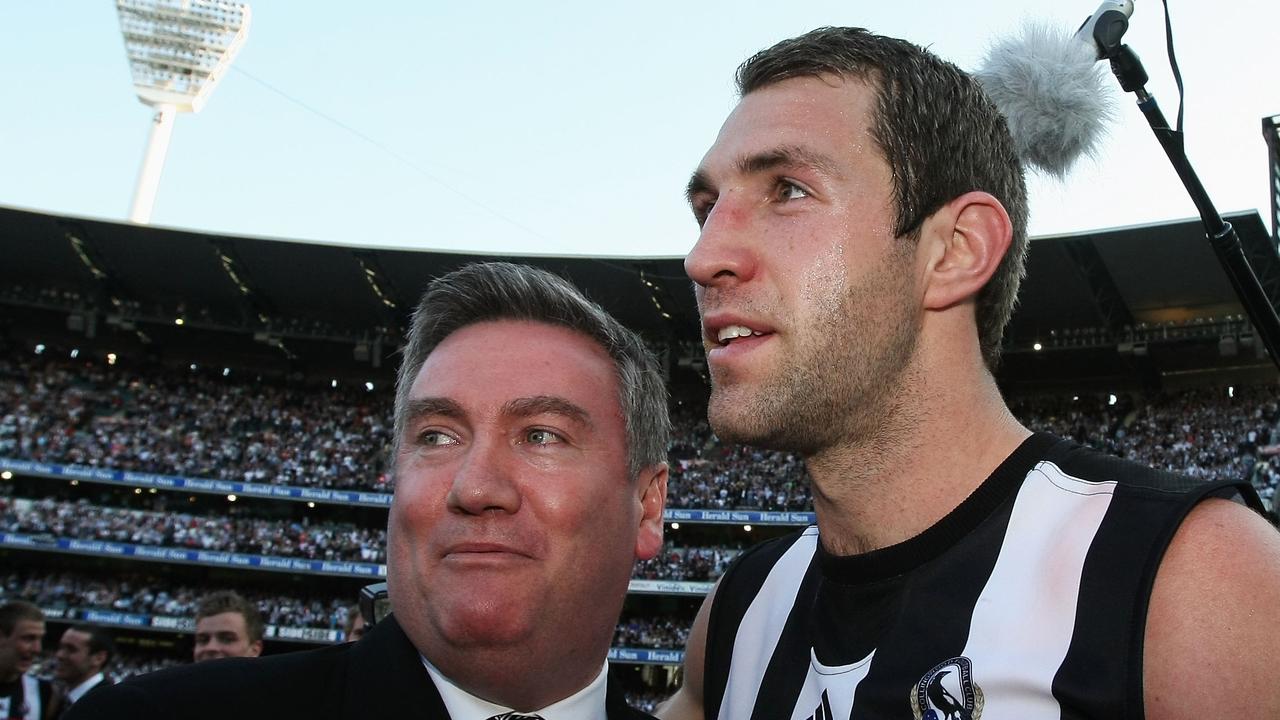 Eddie McGuire and Travis Cloke after winning the 2010 premiership.