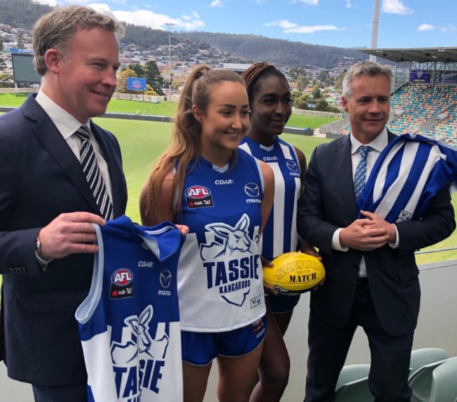 The North Melbourne Tassie Kangaroos show off their AFLW jumper.