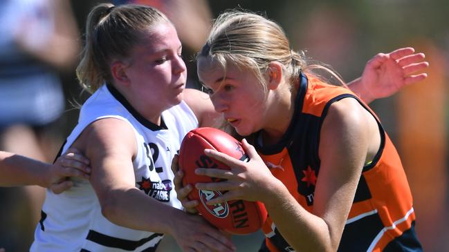 Ashleigh Snow tackles Neve Cowley. Picture: Julian Smith