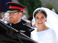 WINDSOR, ENGLAND - MAY 19:  Prince Harry, Duke of Sussex and The Duchess of Sussex leave Windsor Castle in the Ascot Landau carriage during a procession after getting married at St Georges Chapel on May 19, 2018 in Windsor, England.  (Photo by Gareth Fuller - WPA/Getty Images)