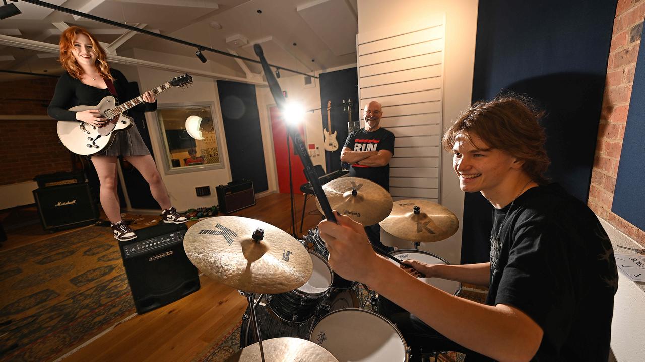 Olivia Shelley and James Hainge practice as principal Brett Wood watches on. Picture: Lyndon Mechielsen
