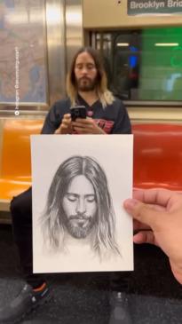 Jared Leto has his portrait done on the NYC subway