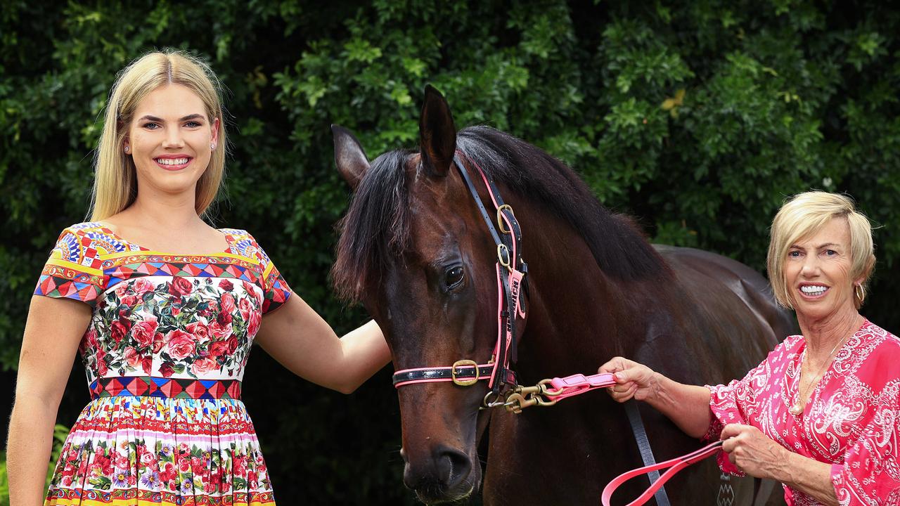 Gold Coast horse trainer Gillian and daughter Tayla Heinrich at their stables with horse Invinsible Tears, which is among the animals registered as a secured asset by Multiplex. Pics Adam Head