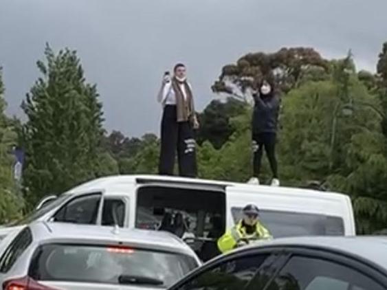 Chaos has broken out at the Melbourne Cup as climate protestors argue with police. Pictures: Facebook