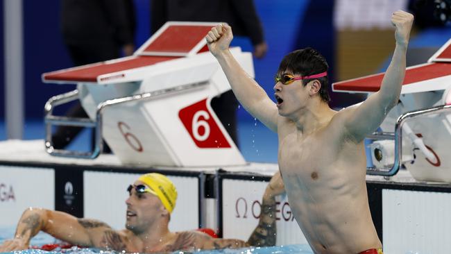 Zhanle Pan celebrates winning the 100m freestyle ahead of Kyle Chalmers. Picture: Michael Klein