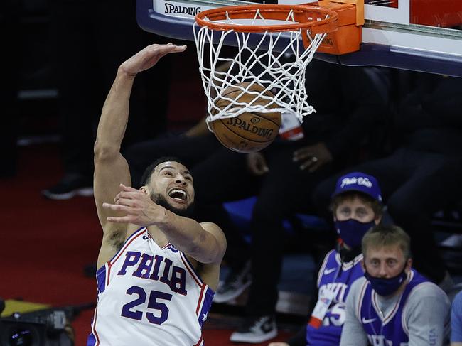 PHILADELPHIA, PENNSYLVANIA - JUNE 20: Ben Simmons #25 of the Philadelphia 76ers dunks during the third quarter against the Atlanta Hawks during Game Seven of the Eastern Conference Semifinals at Wells Fargo Center on June 20, 2021 in Philadelphia, Pennsylvania. NOTE TO USER: User expressly acknowledges and agrees that, by downloading and or using this photograph, User is consenting to the terms and conditions of the Getty Images License Agreement.   Tim Nwachukwu/Getty Images/AFP == FOR NEWSPAPERS, INTERNET, TELCOS & TELEVISION USE ONLY ==