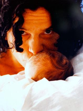 Michael Hutchence with baby daughter Tigerlily. Picture: Seven