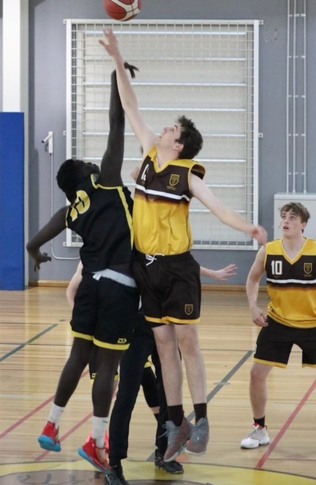 Padua and Lauries' First V basketballers in action.