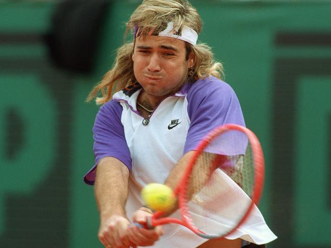 American tennis player Andre Agassi had a memorable mullet in the 1990s. Picture: Jean-Loup Gautreau/AFP