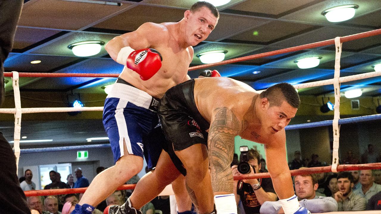 Paul Gallen and Herman Ene-Purcell fight it out in Toowoomba. Friday, Jan 29, 2016.