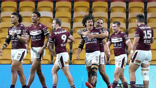 Manly proved too good for the inconsistent tigers, with Morgan Harper scoring a hatrick. Picture: Getty Images.