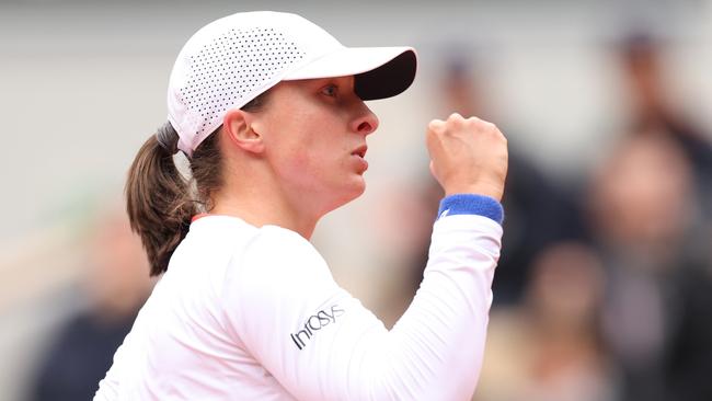 PARIS, FRANCE - JUNE 02: Iga Swiatek of Poland celebrates a point against Anastasia Potapova in the Women's Singles fourth round match during Day Eight of the 2024 French Open at Roland Garros on June 02, 2024 in Paris, France. (Photo by Clive Brunskill/Getty Images)