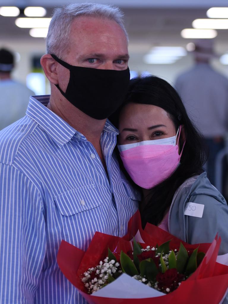 Meta Khloe Maurizio reunites with her partner Shayne Warden at Darwin Airport after 4 months apart. Picture: Amanda Parkinson