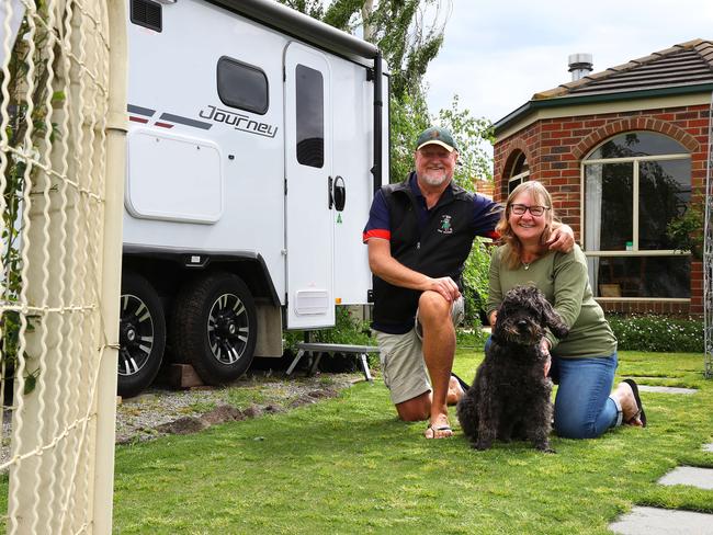 Highton's Denis and Katrina Leahy and dog Angus, home after being stuck in NSW limbo for 34 days because of Covid restrictions. Picture: Alison Wynd