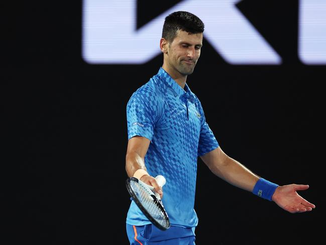 MELBOURNE, AUSTRALIA - JANUARY 21: Novak Djokovic of Serbia reacts during the third round singles match against Grigor Dimitrov of Bulgaria during day six of the 2023 Australian Open at Melbourne Park on January 21, 2023 in Melbourne, Australia. (Photo by Mackenzie Sweetnam/Getty Images)