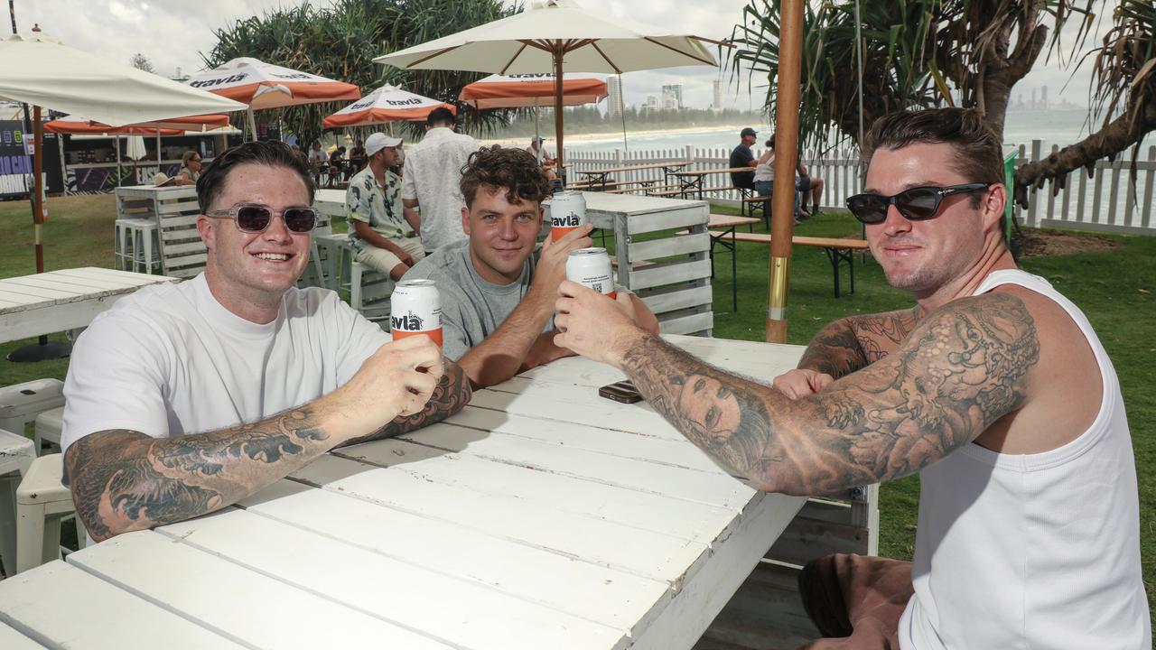 Charlie Redding, Javob Garland and Jack Redding among the crowd at the 2025 Gold Coast Open surf comp at Burleigh Heads. Picture: Glenn Campbell