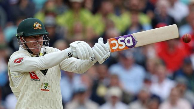 David Warner plays a shot on day four of the fifth Ashes cricket test match .