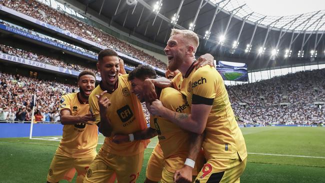 Sheffield United celebrate after taking a shock lead. (Photo by Ryan Pierse/Getty Images)