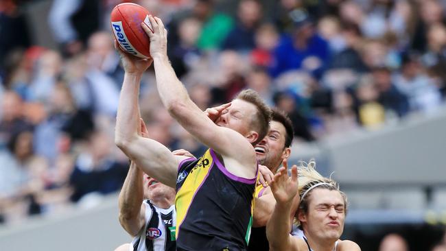 Three-time Coleman Medal winner Jack Riewoldt takes a strong mark amid a pack of Collingwood players. Picture: Mark Stewart