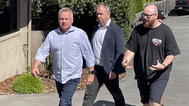 Housing Minister Nic Street and Premier Jeremy Rockliff discuss the Liberals' new policy to abolish stamp duty for first home-buyers. Pictured with Blackmans Bay renter Alex Packer, who would benefit from the pledge. Picture: Rob Inglis