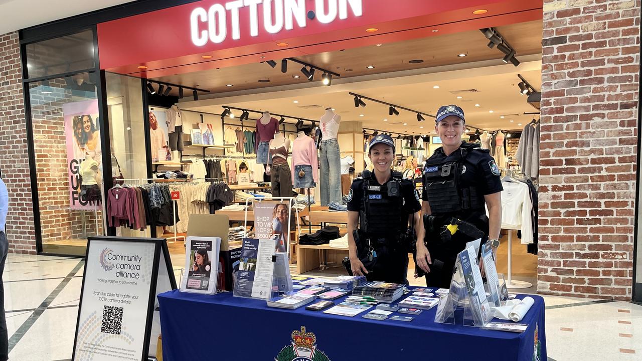 Queensland Police Service officers at a Cairns Central Shopping Centre pop-up information stall on Thursday. Picture: Supplied