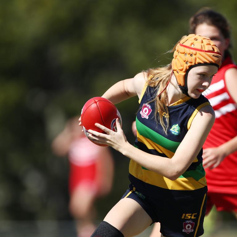 Action from the AFLQ Schools of Excellence competition. Picture: AFLQ