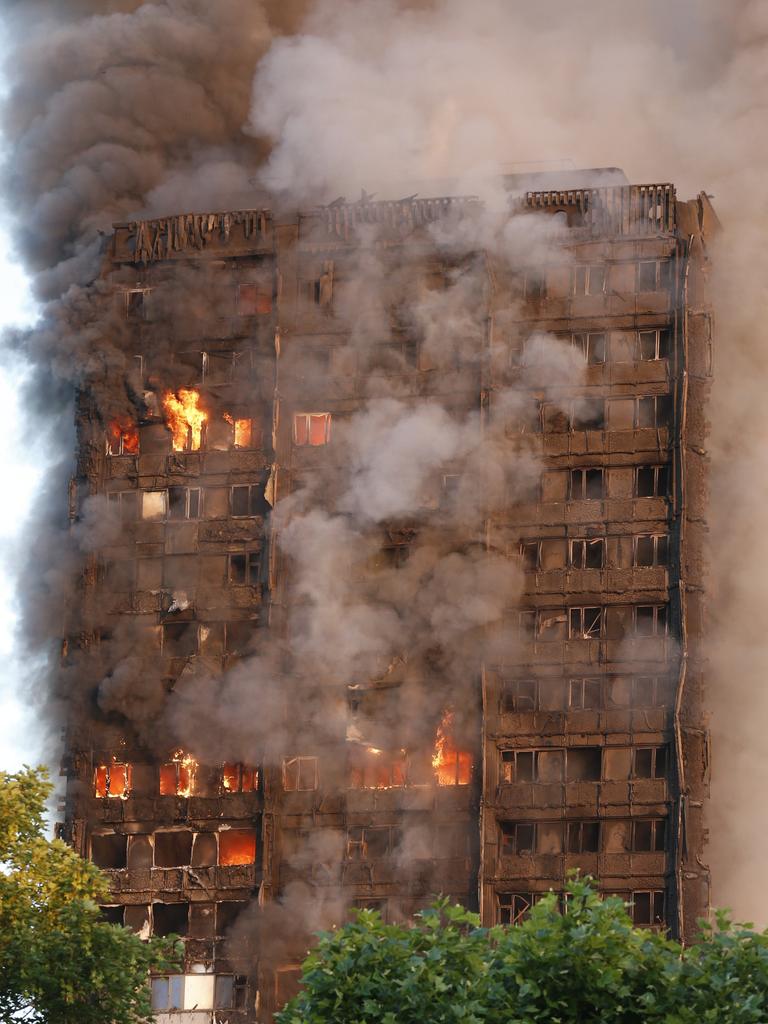 Police and firefighters were called at 1.16am to reports the large fire at a block of flats in the Lancaster West Estate, W11. About 200 firefighters were soon tackling the blaze. Picture: Jamie Lorriman/The Sun