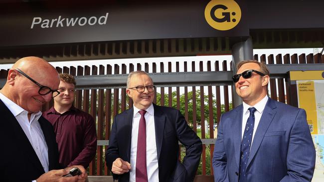 Premier Steven Miles and Prime Minister Anthony Albanese wait to board a tram at Parkwood on the Gold Coast. Picture: Adam Head.