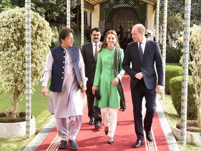 Pakistan's Prime Minister Imran Khan (L) walks with William and Kate. Picture: AFP