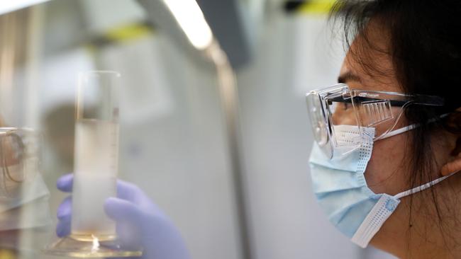 Water quality analyst Seak Lin Ly from Sydney Water test wastewater samples for signs of Covid-19 at Sydney waters Lab in West Ryde. Picture: Damian Shaw