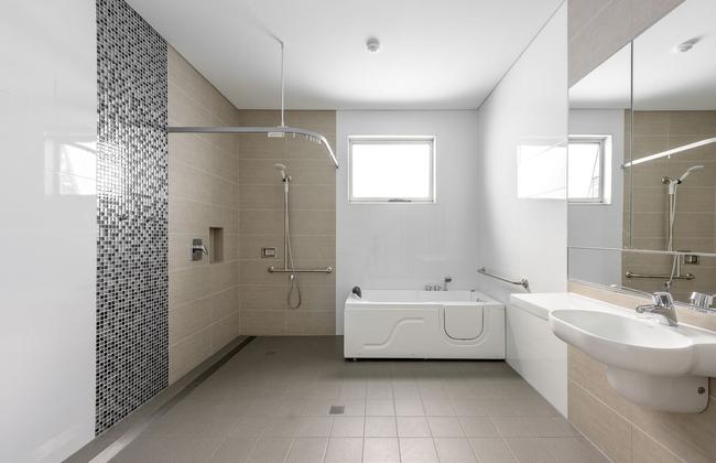 As one in five people in Australis lives with a disability, new housing standards must provide minimum universal design features such as step-free access to at least one entry doorway, internal doors and passageways that are wider than usual, a visitable toilet on the entry level with some circulation space available in front of the pan a hobless shower (above).