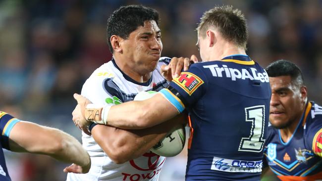 Cowboys star Jason Taumalolo charges into the Titans defence at Cbus Super Stadium. Picture: Getty Images