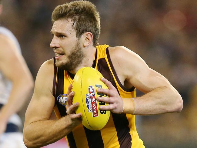 Second Qualifying Final. Geelong vs Hawthorn at the MCG. Grant Birchall cleans up across half back . Pic: Michael Klein