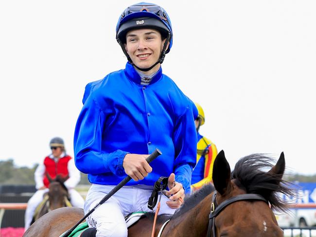 KEMBLA GRANGE, AUSTRALIA - NOVEMBER 19: Zac Lloyd on Athelric returns to scale after winning race 7 The Warra during Sydney Racing at Kembla Grange Racecourse on November 19, 2022 in Kembla Grange, Australia. (Photo by Mark Evans/Getty Images)