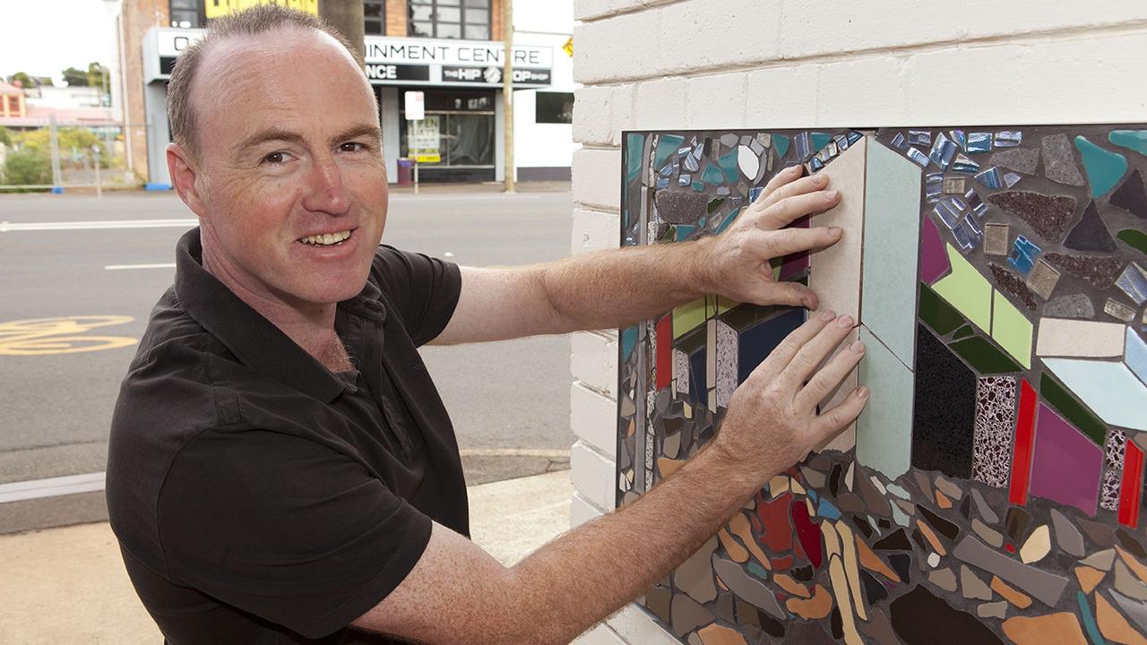 Artist Des Verdon installing his mosaic as part of the Toowoomba Splashing Back Art Trail at Brumby's Go back in 2013. Picture: Contributed