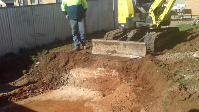 Police excavate under a shed at Helen Courtney’s Ingle Farm home in 2008. Picture: SAPOL