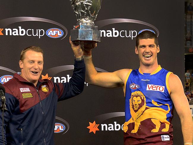 With Jonathan Brown and the pre-season cup in 2013 – Voss’ last year as coach.