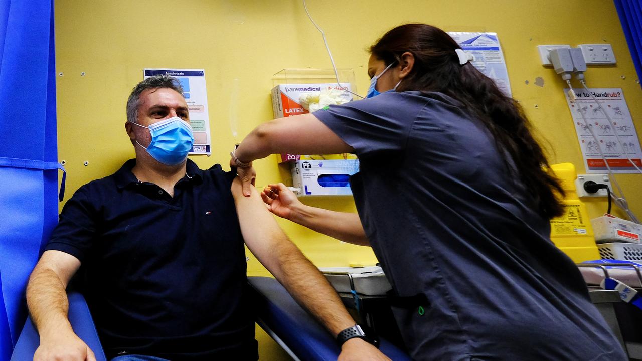 Michael Graham, the CEO of Victoria Aboriginal Health Services, is pictured receiving his COVID-19 vaccination in Melbourne. Picture: NCA NewsWire/ Luis Ascui