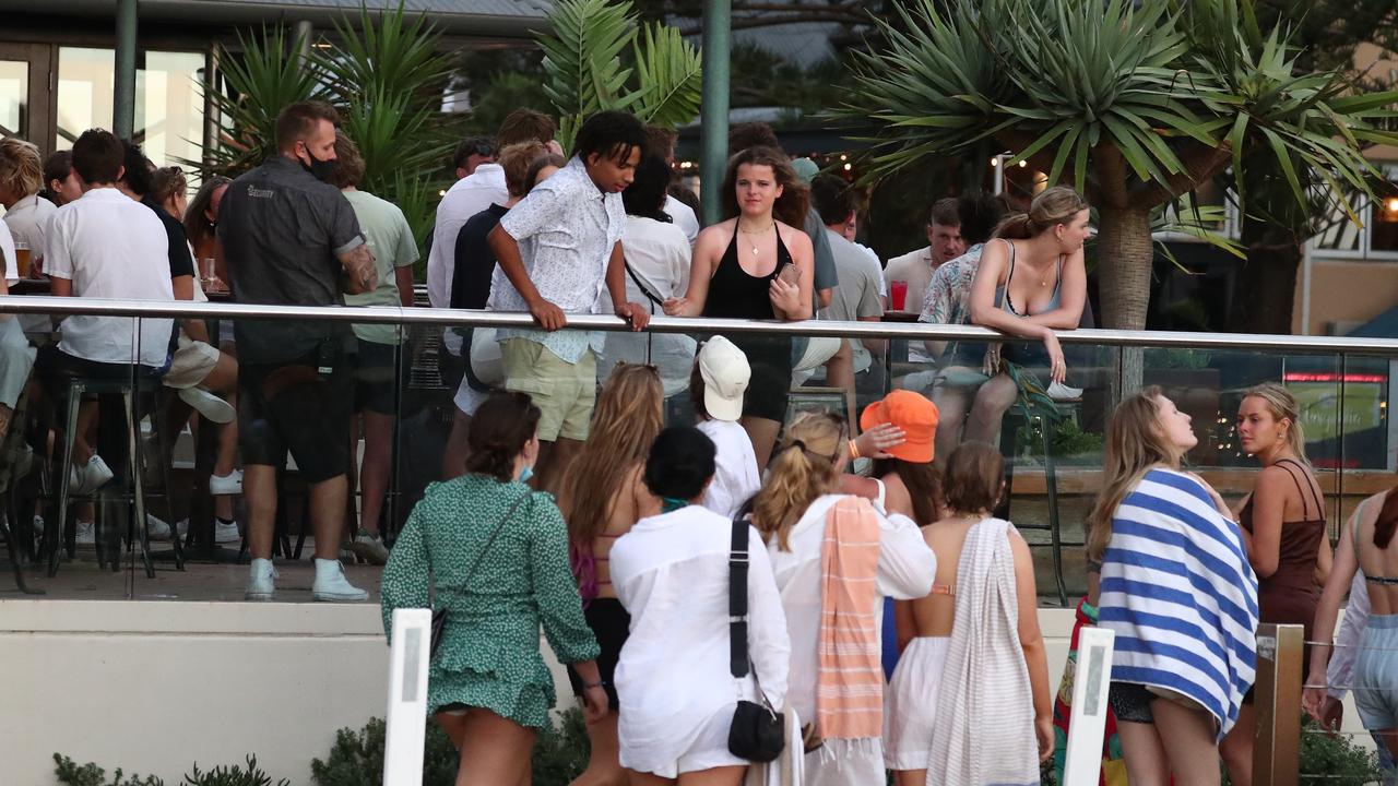 Beach Hotel security monitor the crowds flowing around the pub and beer garden. Picture: Jason O'Brien