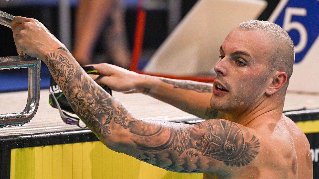 Australia's Kyle Chalmers reacts after winning the men's 50 metre butterfly final. Photo by Brenton Edwards / AFP