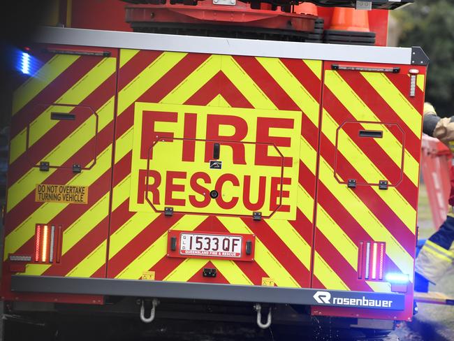 Fireys attend a house fire in Toowoomba, fire and rescue sign generic, QFES, Friday, June 23, 2023. Picture: Kevin Farmer