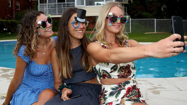 NYE selfie time for Olivia Sidoti (l to r), Sophie Sidoti and Bianca Seale. Picture: Toby Zerna