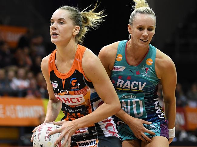 Good mates and rival players Kim Green (left) and Renae Ingles in action.