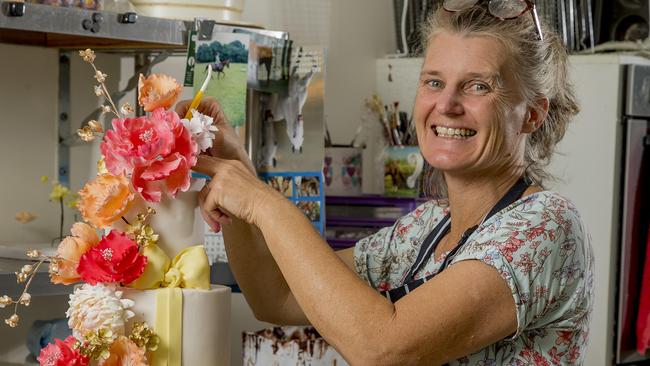 Local cake maker, Louisa Massignani from Cakes Alouisa with one of her creations. Picture: Jerad Williams