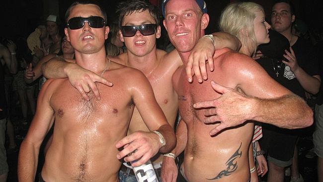 Three shirtless guys at the Stereosonic Music Festival at Fox Studios, Moore Park, Sydney 28/11/2009. Promoters and police w...